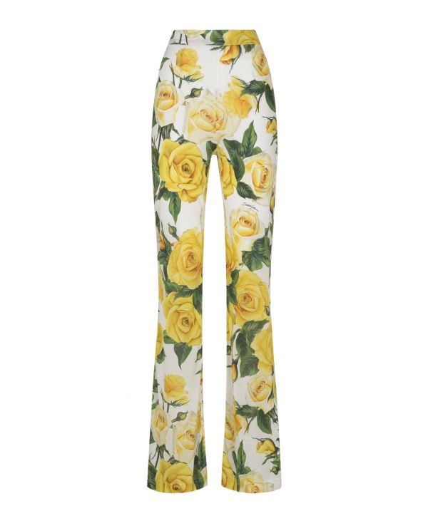 Flared trousers in organdie with a multicoloured rose print